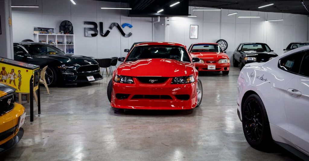 A collection of luxury sports cars in a modern illuminated showroom, showcasing sleek design and elegance.